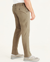 Side view of model wearing New British Khaki Workday Khakis, Athletic Fit (Big and Tall).
