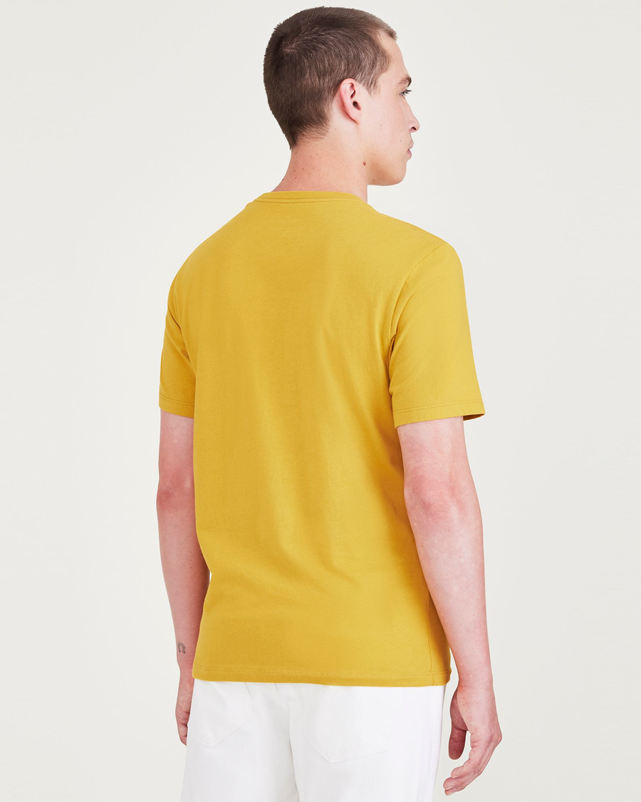 Back view of model wearing Nugget Gold Varsity Arch Graphic Tee, Slim Fit.