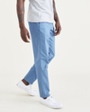 Side view of model wearing Oceanview Original Chinos, Straight Tapered Fit.