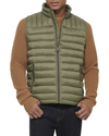 Front view of model wearing Olive Lightweight Nylon Packable Vest.