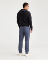 Back view of model wearing Ombre Blue Go Jogger, Slim Tapered Fit with Airweave.