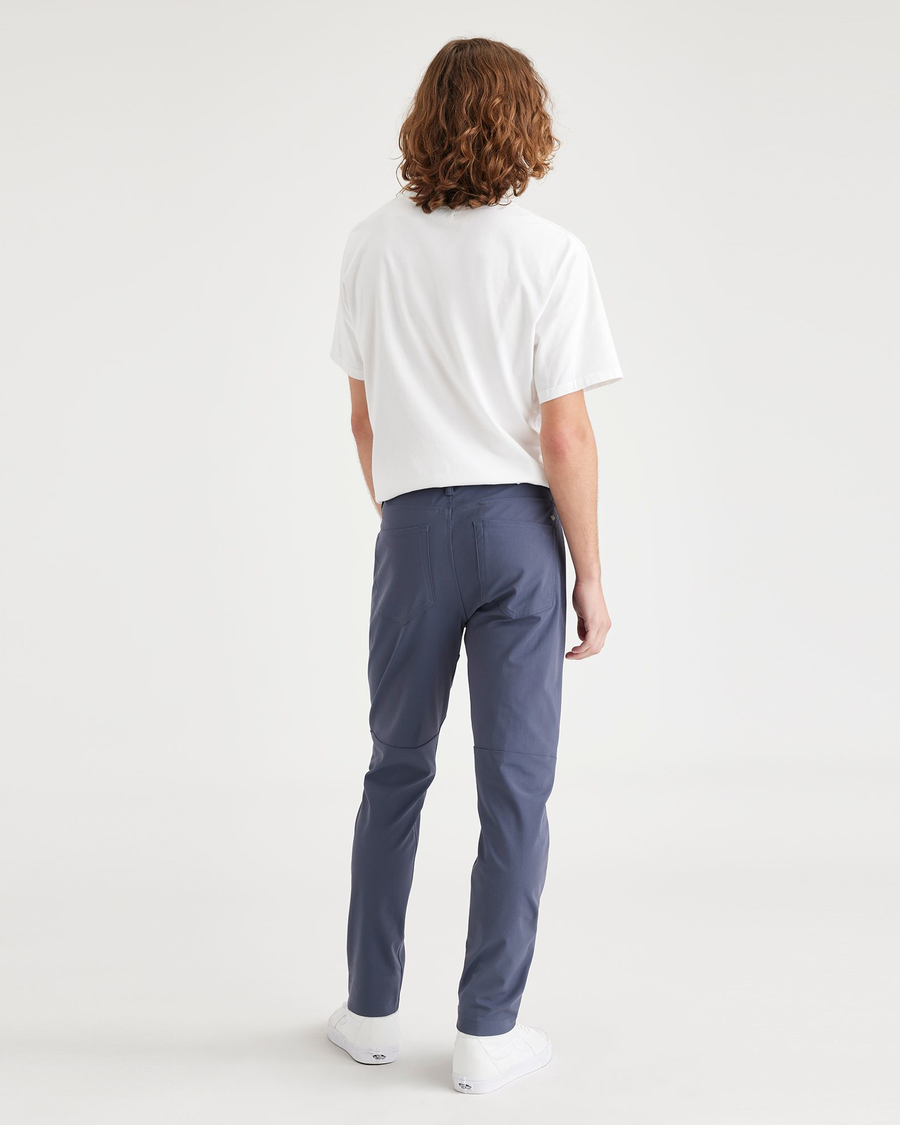 Back view of model wearing Ombre Blue Go Pant, Slim Tapered Fit with Airweave.