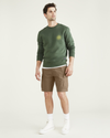 Front view of model wearing Otter Tech Cargo 9" Shorts.