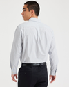 Back view of model wearing Pinnacle Lucent White Essential Button-Up Shirt, Classic Fit.