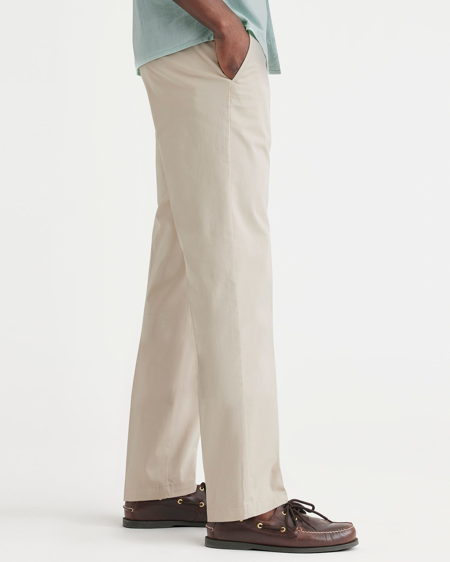 Side view of model wearing Sahara Khaki Essential Chinos, Straight Fit.