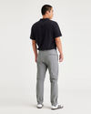 Back view of model wearing Sharkskin Go Chino, Slim Tapered Fit with Airweave.