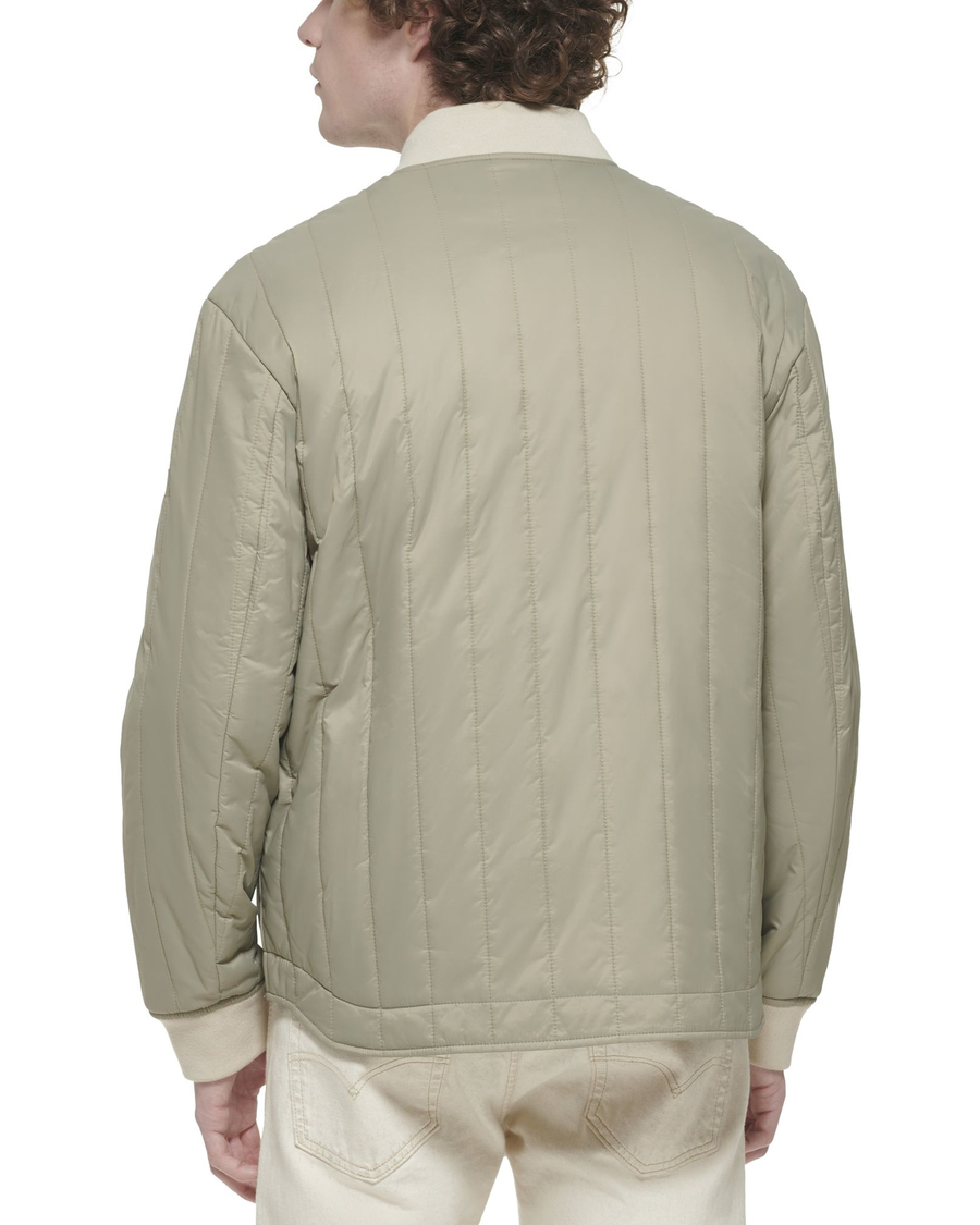 Back view of model wearing Silver Sage Recycled Nylon Channel Quilted Bomber Jacket.
