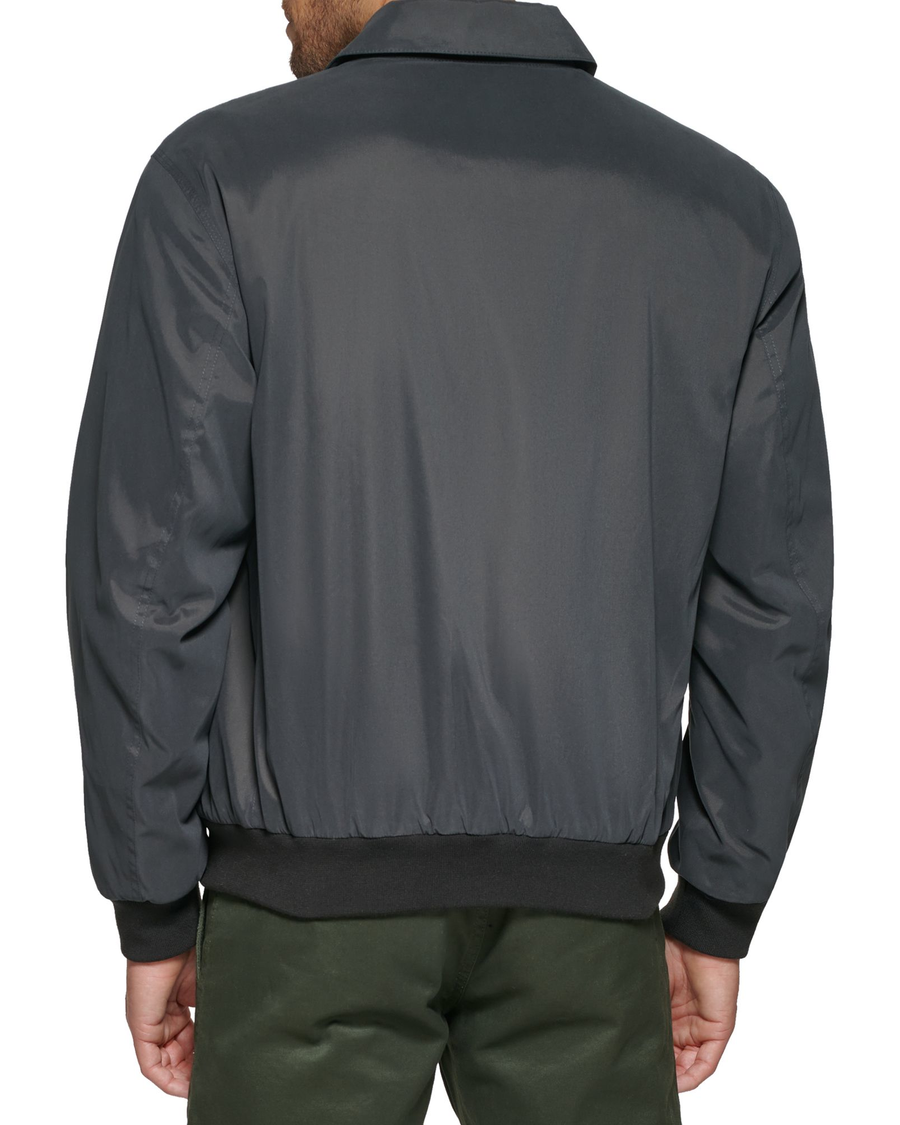 Back view of model wearing Steelhead Microtwill Relaxed Laydown Collar Bomber.