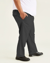 Side view of model wearing Steelhead Signature Khakis, Pleated, Classic Fit (Big and Tall).