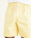 View of model wearing Sundress Playa 7" Shorts.