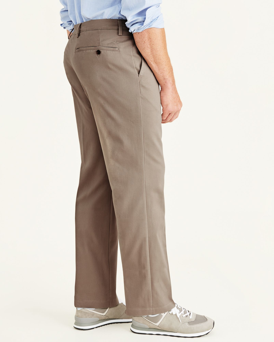 Side view of model wearing Timber Wolf Easy Khakis, Classic Fit (Big and Tall).