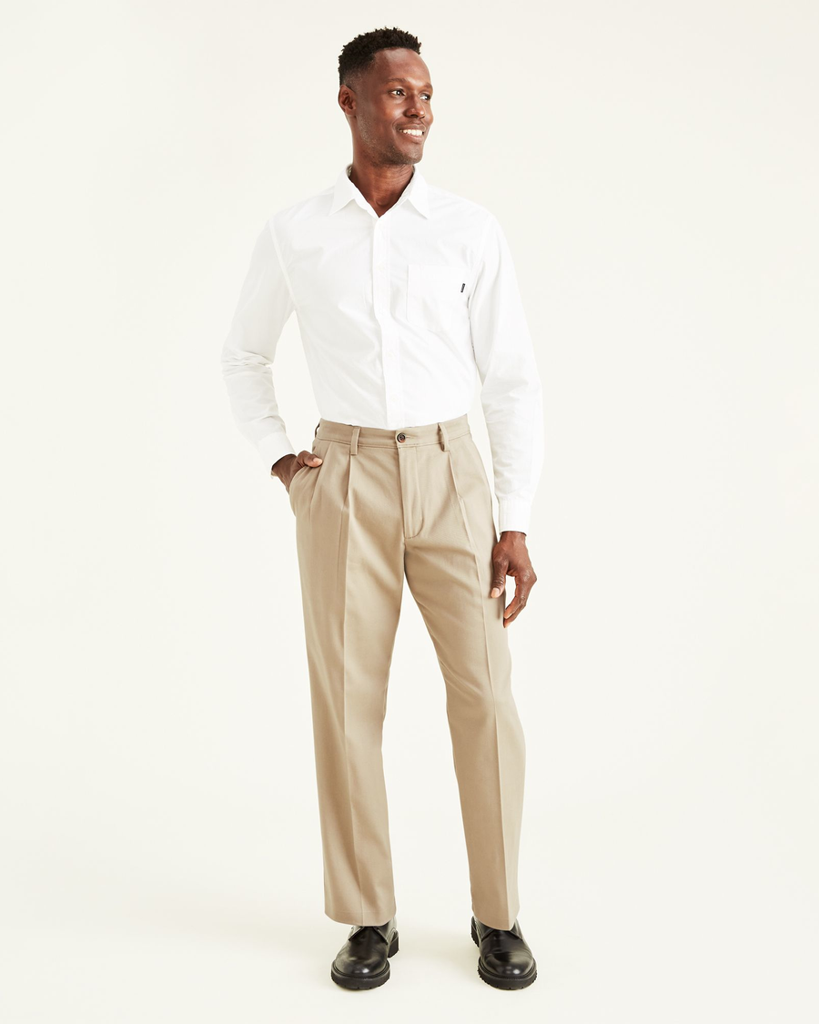Front view of model wearing Timber Wolf Easy Khakis, Pleated, Classic Fit.