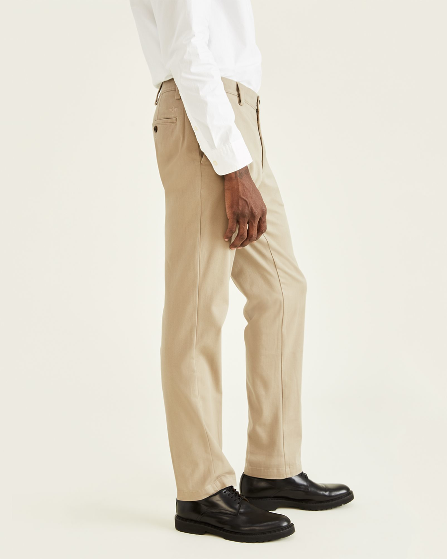 Side view of model wearing Timber Wolf Easy Khakis, Straight Fit.