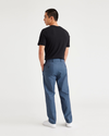 Back view of model wearing Vintage Indigo City Tech Trousers, Slim Fit.