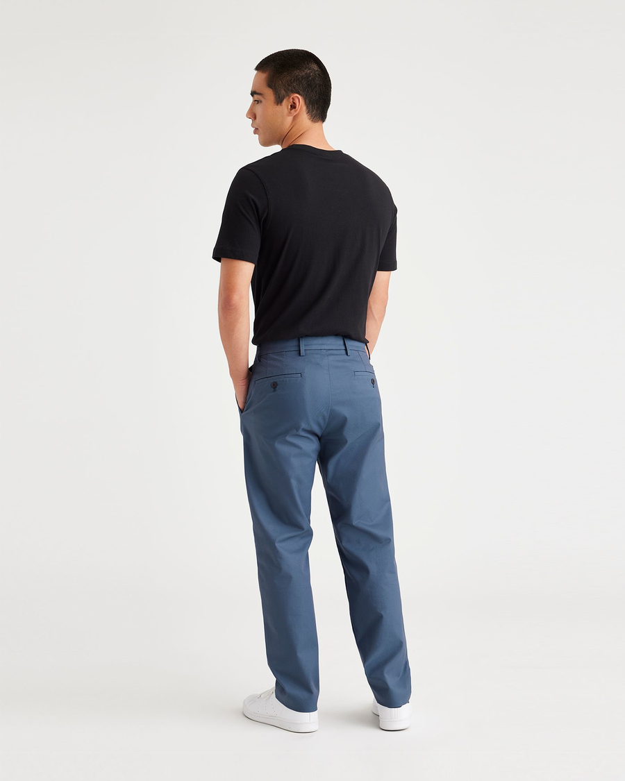 Back view of model wearing Vintage Indigo City Tech Trousers, Slim Fit.