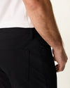 Front view of model wearing Beautiful Black Go Airweave 5-Pocket, Slim Tapered Fit.
