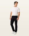 Back view of model wearing Beautiful Black Go Airweave 5-Pocket, Slim Tapered Fit.