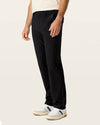 Side view of model wearing Beautiful Black Go Airweave Chino, Straight Fit.