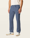 Side view of model wearing Ombre Blue Go Airweave 5-Pocket, Straight Fit.