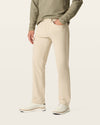 Side view of model wearing Sahara Khaki Go Airweave 5-Pocket, Straight Fit.