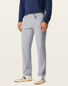 Side view of model wearing Sharkskin Go Airweave 5-Pocket, Straight Fit.