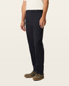 Side view of model wearing Black Easy Khakis, Classic Fit.