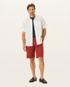 Front view of model wearing Bank Red Perfect 10.5