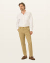 Front view of model wearing New British Khaki Workday Khakis, Slim Fit.