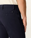 View of model wearing Dark Pebble Workday Khakis, Slim Fit.