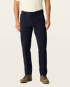 Front view of model wearing Dark Pebble Workday Khakis, Slim Fit.