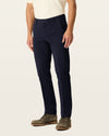 Side view of model wearing Dark Pebble Workday Khakis, Slim Fit.