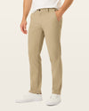 Side view of model wearing Timber Wolf Easy Khakis, Slim Fit.