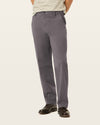 Back view of model wearing Storm Workday Khakis, Classic Fit.