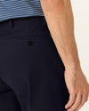 View of model wearing Pembroke Workday Khakis, Classic Fit.