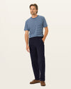 Front view of model wearing Pembroke Workday Khakis, Classic Fit.