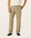View of model wearing Khaki Easy Khakis, Pleated, Relaxed Fit.