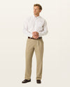View of model wearing Khaki Easy Khakis, Pleated, Relaxed Fit.