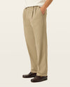 View of model wearing Khaki Easy Khakis, Pleated, Relaxed Fit.