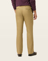 Side view of model wearing New British Khaki Signature Khakis, Straight Fit.