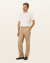 Front view of model wearing New British Khaki Signature Iron Free Khakis, Classic Fit with Stain Defender®.