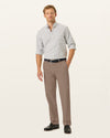 Front view of model wearing Timber Wolf Signature Iron Free Khakis, Straight Fit with Stain Defender®.