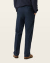 Back view of model wearing Navy Blazer Signature Iron Free Khakis, Straight Fit with Stain Defender®.