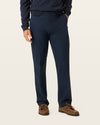 Side view of model wearing Navy Blazer Signature Iron Free Khakis, Straight Fit with Stain Defender®.