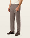 View of model wearing Dark Pebble Signature Iron Free Khakis, Straight Fit with Stain Defender®.