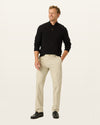 Front view of model wearing Cloud Signature Iron Free Khakis, Straight Fit with Stain Defender®.