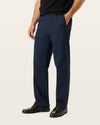 Side view of model wearing Navy Blazer Signature Iron Free Khakis, Relaxed Fit with Stain Defender®.