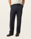 Side view of model wearing Steelhead Signature Iron Free Khakis, Relaxed Fit with Stain Defender®.