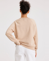 Back view of model wearing Appleblossom Crewneck Sweatshirt, Classic Fit.