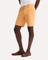 Side view of model wearing Apricot Tan Ultimate 9.5