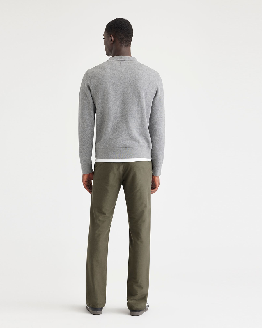 Back view of model wearing Army Green Comfort Knit Chinos, Slim Fit.